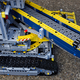 More tank treads, but here they’re used as conveyor belts to move Lego debris along.